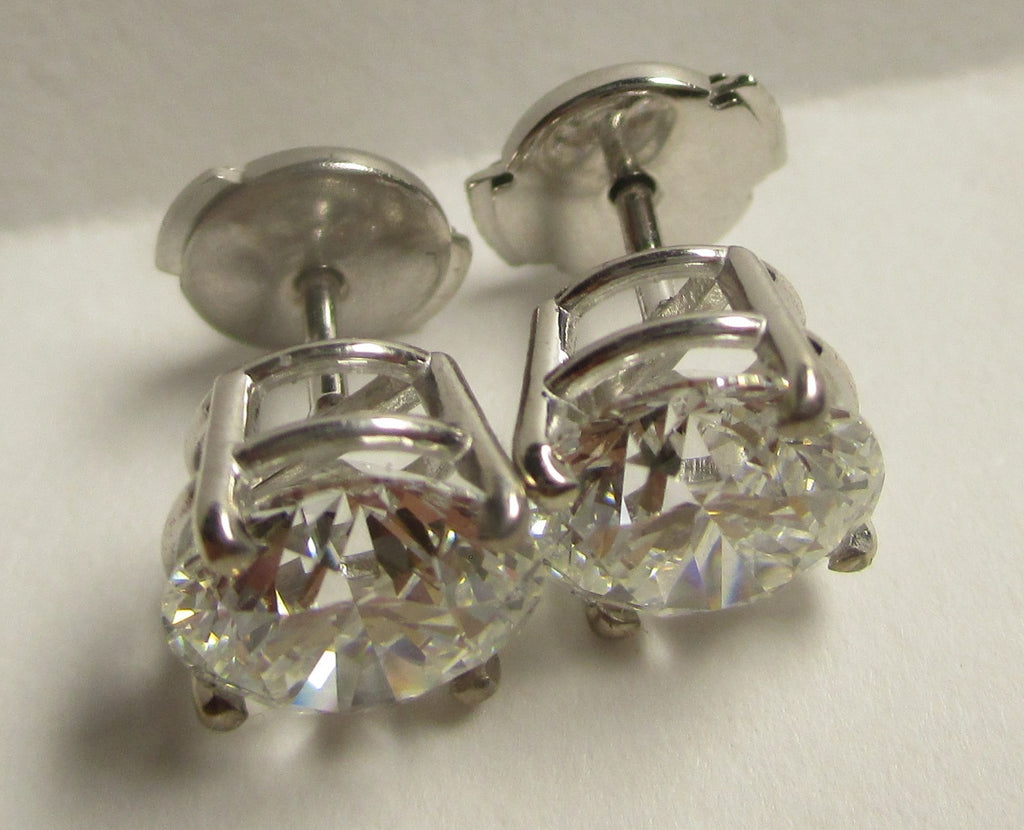 Natural diamond stud earrings .33 Ct. tw. to 2.50 Ct. tw. in solid 14K gold with screw backs or Guardian backs