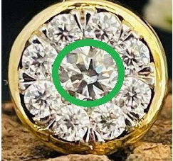 1 carat round brilliant solitaire bezel set solitaire in 14K solid yellow gold.