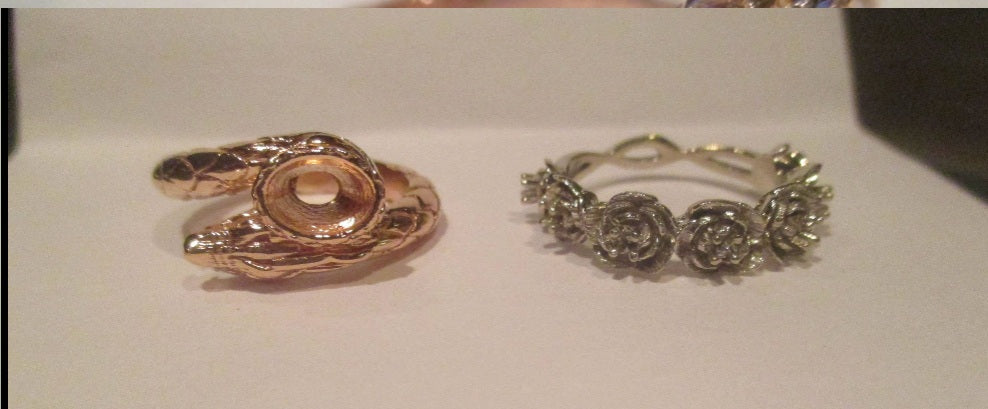 14k Gold fabulous Dragon Ring set with an Oval diamond or gemstone and a Ruby Accentcomes with an official game of Thrones hat