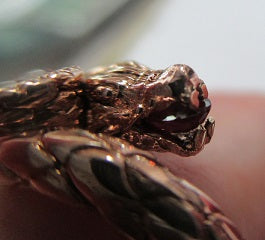 14k Gold fabulous Dragon Ring set with an Oval diamond or gemstone and a Ruby Accentcomes with an official game of Thrones hat
